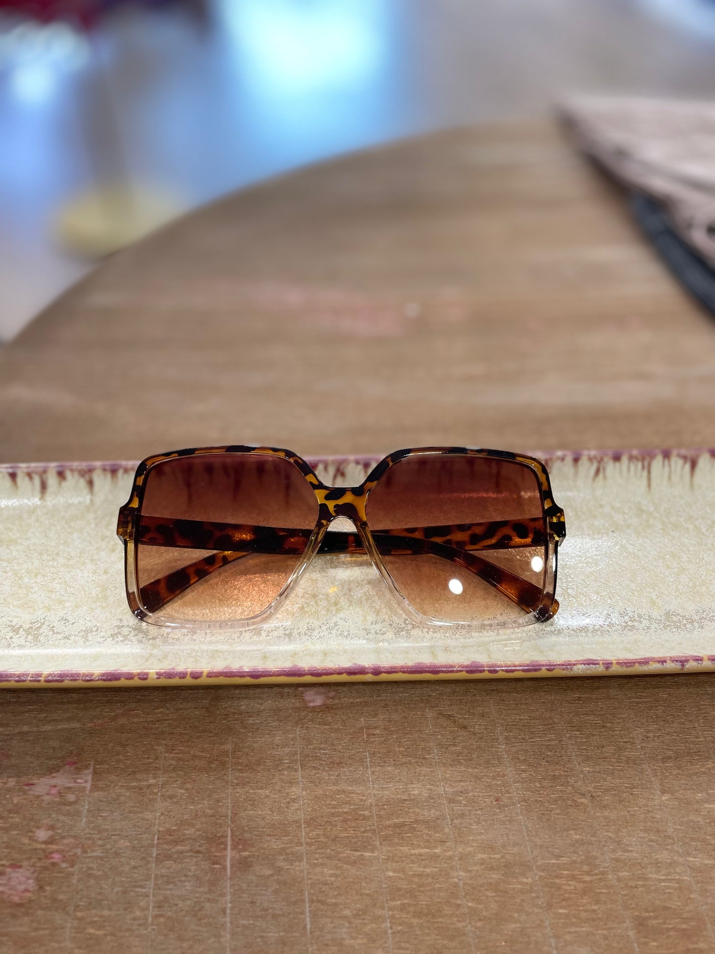 Oversized tortoise shell and clear sunglasses