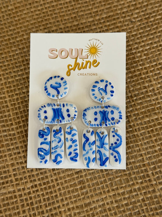 Blue and white mosaic clay earrings