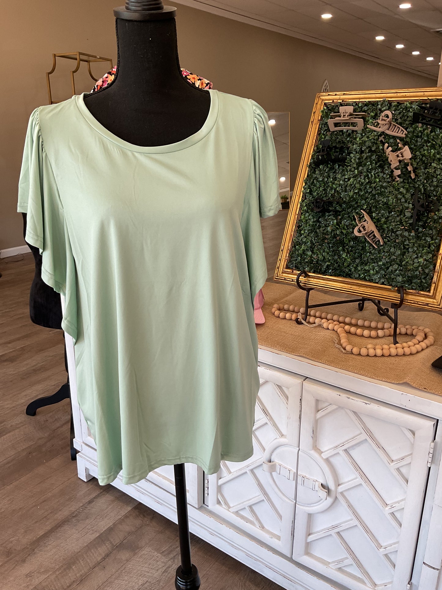 Sage top with ruffle sleeves