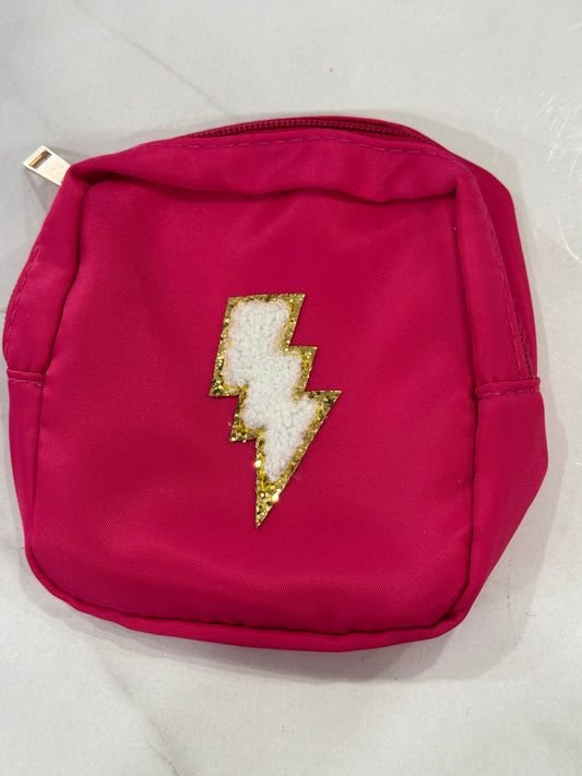 Maroon mini bag with white lightning bolt