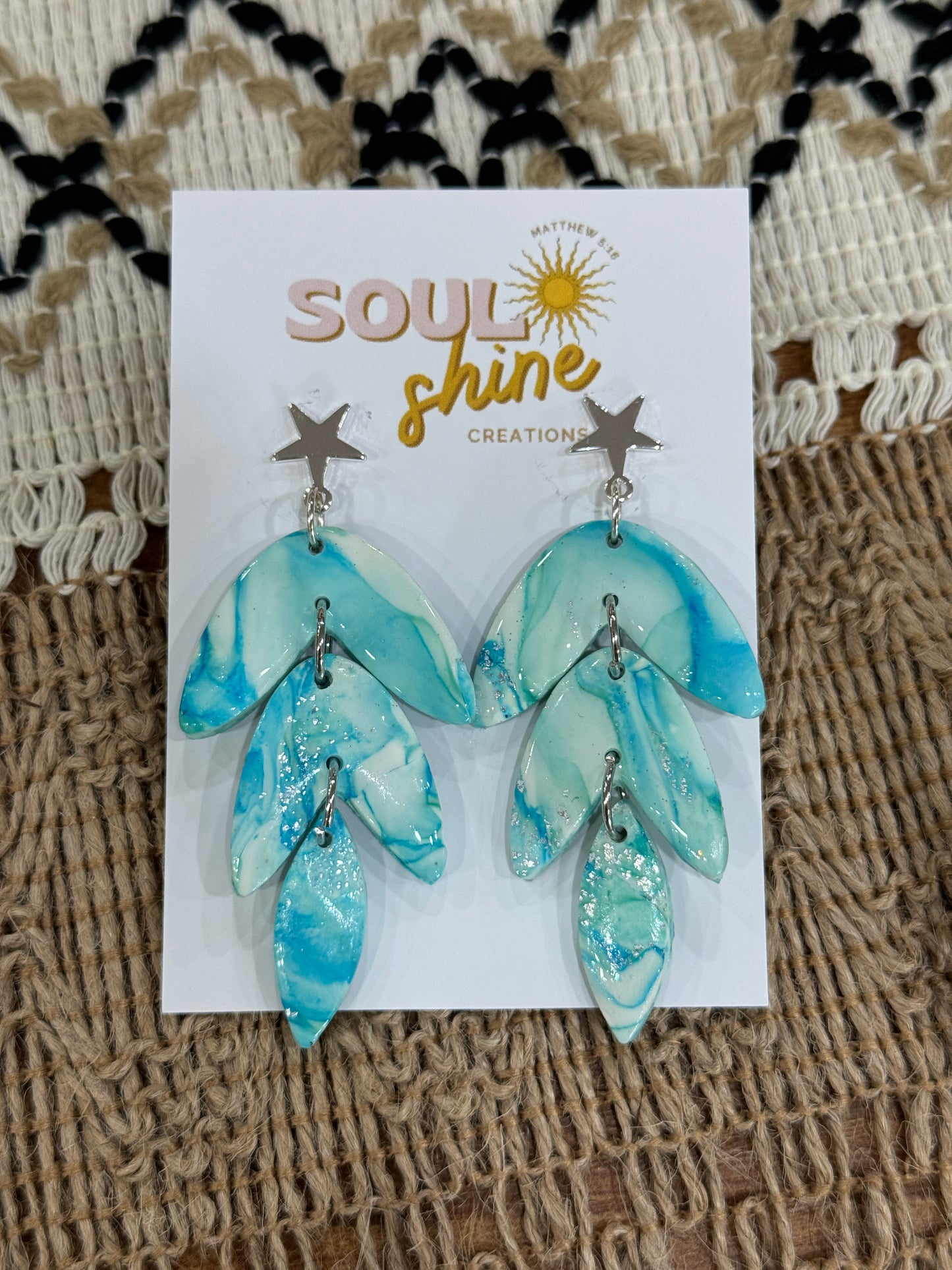 Light blue marble clay dangles